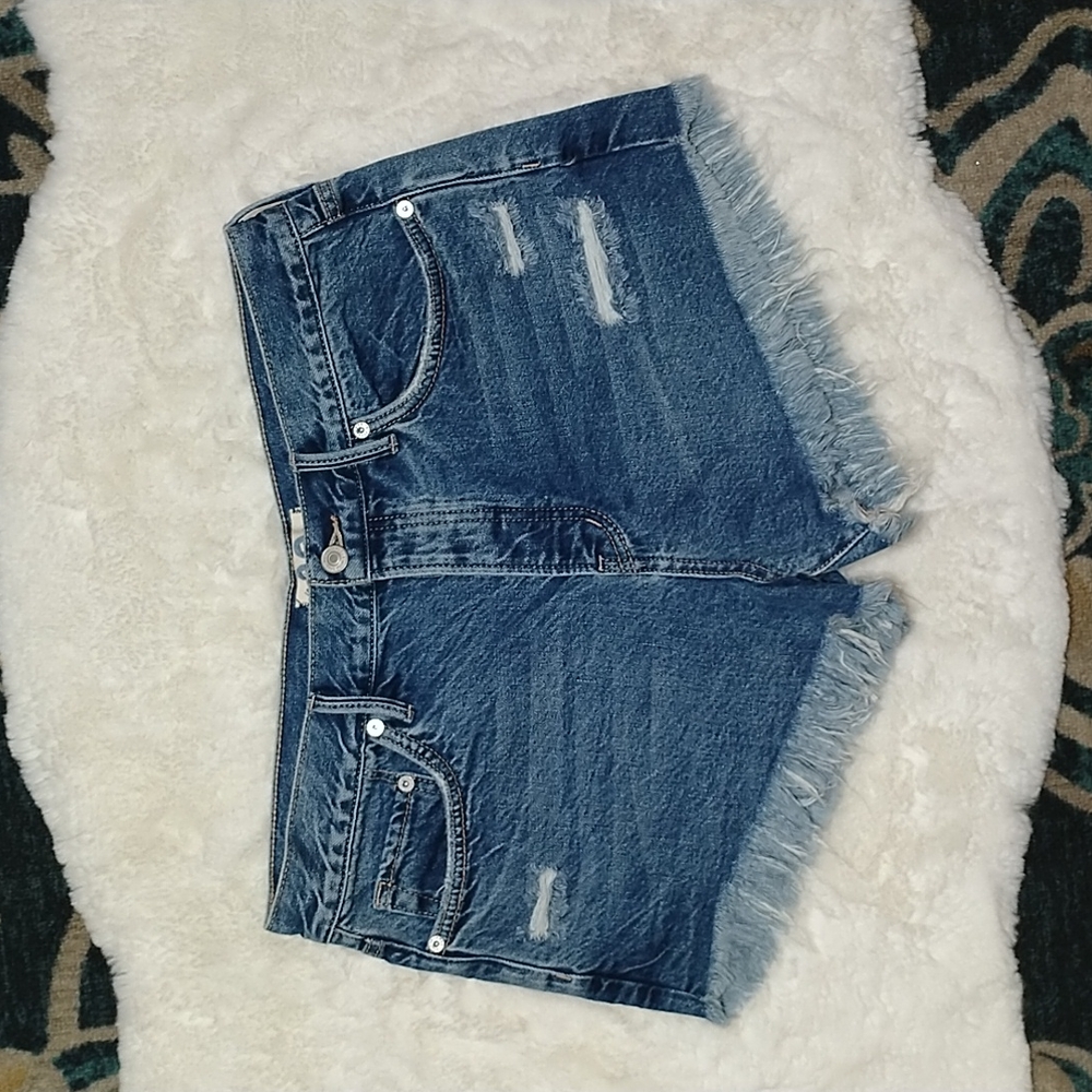Free people high rise distressed fray hem jean shorts